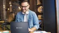 Man in cafe on laptop-Lifestyle