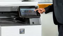 Man using document and print management services