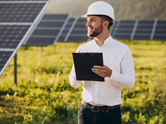 man taking notes on PV plant