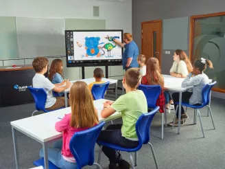 Young students in classroom with teacher-Audio Visual-Product