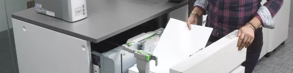 A person using a printer